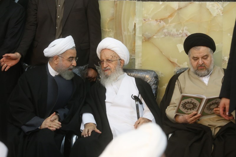 President Hassan Rouhani at memorial ceremony for his mother in Qom