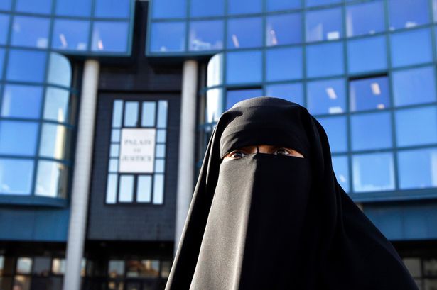 Women wearing full-face Niqab