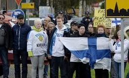 Small group demonstrate in Finland against refugees, Muslims