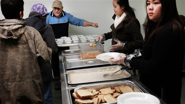 Breakfast is served by volunteers at the Seashore Mission which offers services to the homeless and those in need on January 3, 2016 in Biloxi, Mississippi. (AFP photo)
