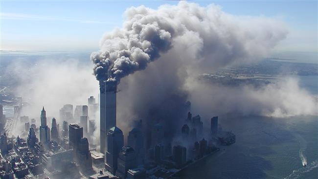 Smoke billows from the Twin Towers in New York, September 11, 2001