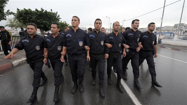 Algerian policemen are seen in the capital, Algiers.