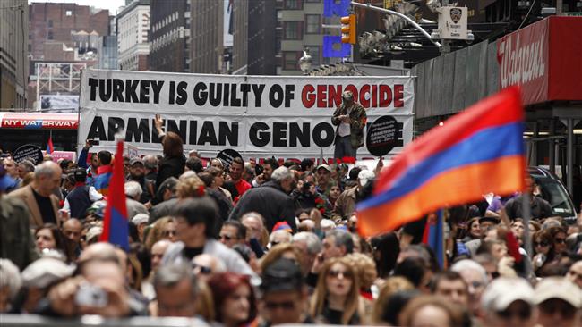 Thousands of Armenian-Americans gather in Times Square to commemorate the 102nd anniversary of Armenian Genocide, in New York City on April 24, 2017
