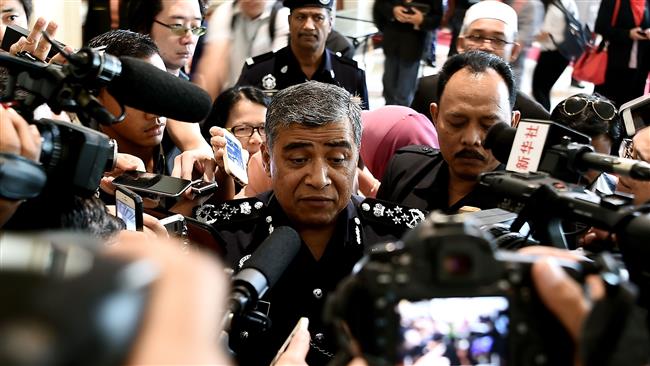 Malaysian Police chief Khalid Abu Bakar (C) speaks to reporters on March 16, 2017. (Photo by AFP)
