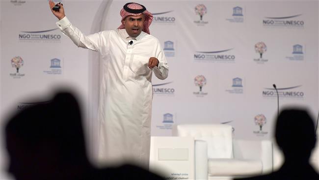Saudi artist Ahmed Mater presents his work on stage during the UNESCO NGO Forum in Riyadh on May 3, 2017. (Photo by AFP)
