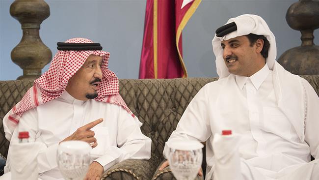 Saudi King Salman, left, talks to Qatari Emir Hamad bin Khalifa Al Thani in this undated photo. Riyadh took the lead on Monday to sever relations with Doha.
