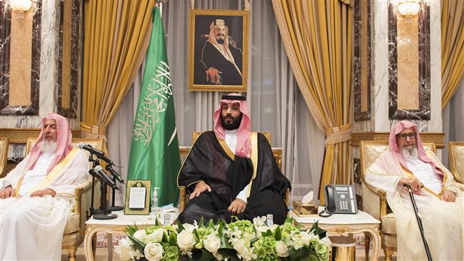 Saudi Crown Prince Mohammed bin Salman Al Saud (C) sits as royal family members and other officials pledge allegiance to him at the Royal Palace in Mecca on June 21, 2017. (Photos by AFP)
