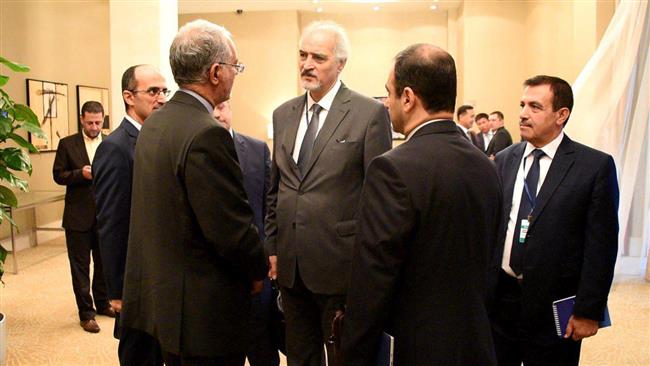 Syria’s Ambassador to the United Nations Bashar al-Ja’afari (C) is seen in Astana on July 4, 2017, as the Kazakh capital hosts a fifth round of talks between the Syrian government and opposition.
