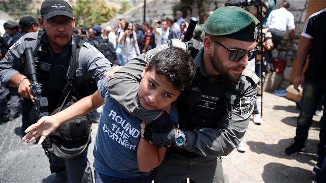 Israeli forces detain a Palestinian youth during a demonstration outside the Lions’ Gate, a main entrance to the al-Aqsa Mosque compound, in the Old City of Jerusalem al-Quds, July 17, 2017. (Photo by AFP)