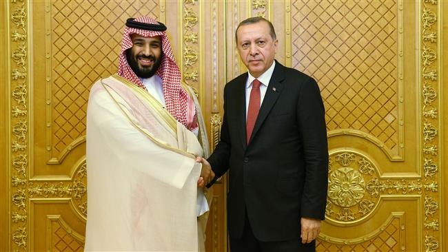 This handout photo taken on July 23, 2017 shows Turkish President Recep Tayyip Erdogan (R) shaking hands with Saudi crown prince Mohammed bin Salman (L) during a meeting in Jeddah, Saudi Arabia. (Via AFP)