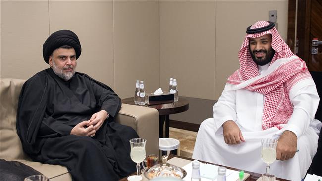 A handout picture provided by the Saudi Royal Palace on July 30, 2017 shows Crown Prince Mohammed bin Salman (R) receiving Prominent Iraqi Shia cleric Muqtada al-Sadr. (Photo by AFP)
