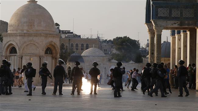 Israeli forces fire teargas to disperse Palestinians after clashes inside the al-Aqsa Mosque