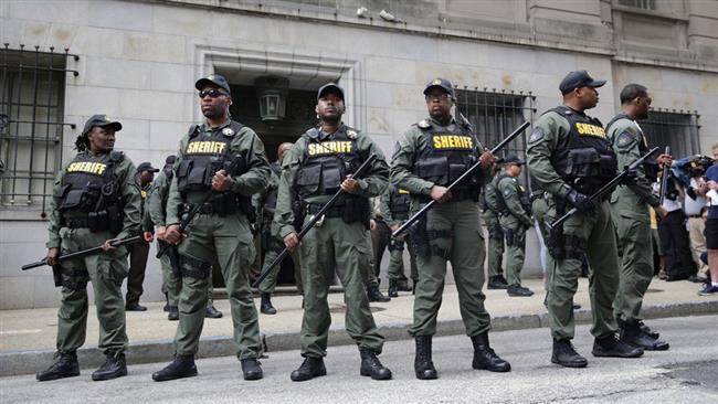 Baltimore County Sheriffs officers guard in front of a court house on June 23, 2016 in Baltimore, Maryland. (Photo by AFP)

