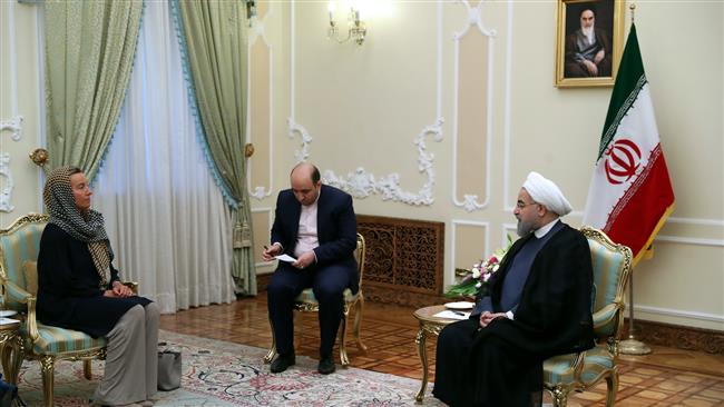 Iranian President Hassan Rouhani (R) and European Union foreign policy chief Federica Mogherini meet in Tehran on August 5, 2017. (Photo by president.ir)
