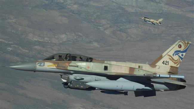 This file photo shows two Israeli Air Force F-16 fighter jets in flight.
