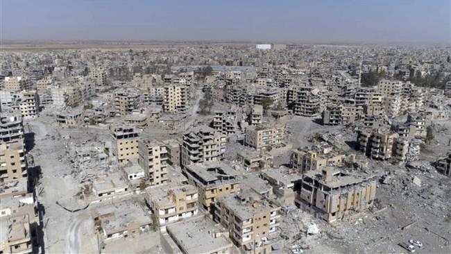 The aerial photo shows damaged buildings in the Syrian city of Raqqah on October 19, 2017 after the US-led coalition said they purged the city of Daesh terrorists. (AP photo)

