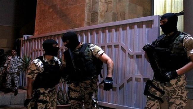 In this file photo, Lebanese security forces stand outside the headquarters of the Lebanese General Security Directorate in Beirut, Lebanon. (Photo by the Daily Star)
