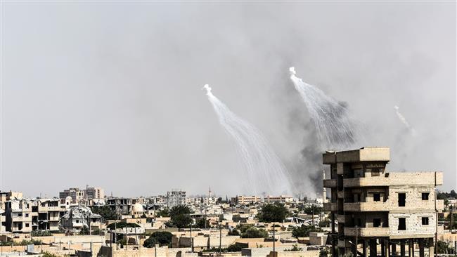 Smoke billows following a US-led airstrike on Syria’s city of Raqqah on July 17, 2017. (AFP photo)

