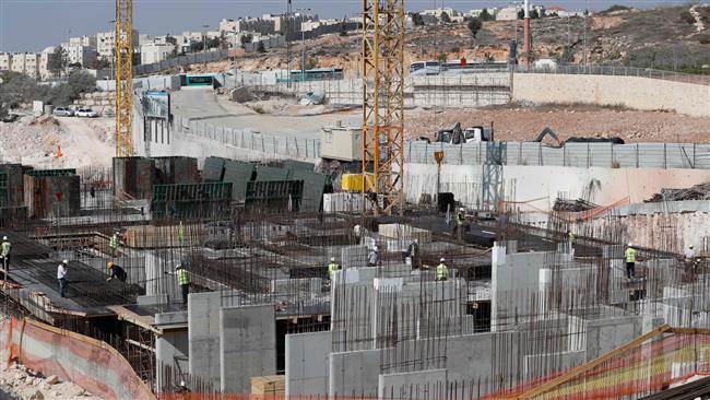A picture taken on November 8, 2017 shows a general view of construction work in the occupied West Bank settlement of Ramat Shlomo. (Photo by AFP)
