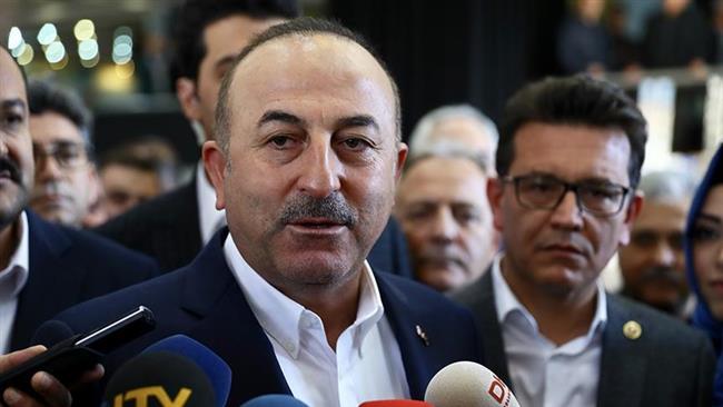 Turkish Foreign Minister Mevlut Cavusoglu speaks to reporters in the capital Ankara on January 27, 2018. (Photo by Anadolu news agency)
