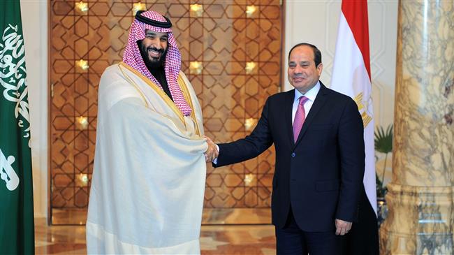 This handout picture released by the Egyptian Presidency on March 4, 2018, shows Egyptian President Abdel Fattah el-Sisi (R) welcoming Saudi Arabia