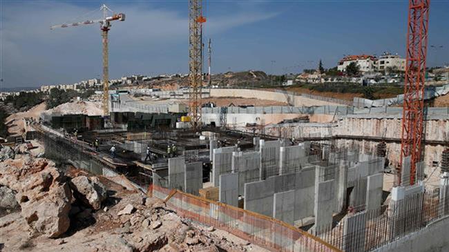 A picture taken on November 8, 2017 shows a general view of construction work in the Ramat Shlomo settlement in the mainly Palestinian eastern sector of occupied Jerusalem al-Quds. (Photo by AFP)
