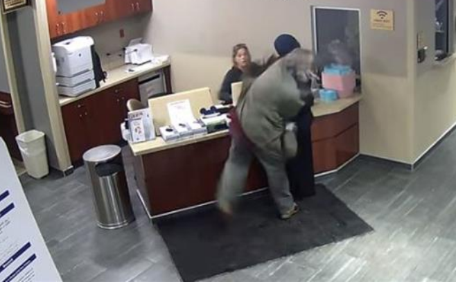 This video grab shows a Muslim woman being punched in a suspected hate at attack at a Michigan hospital.
