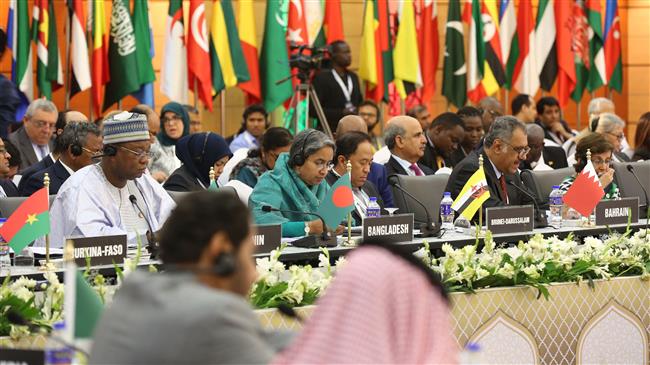 Foreign ministers and diplomats of the 53-member Organization of Islamic Conference (OIC) attend a conference in Dhaka on March 6, 2018. (Photo by AFP) Islamic foreign ministers on May 6 launched a campaign to mobilise international support for action against Myanmar over the Rohingya refugee crisis, officials said. / AFP / STR
