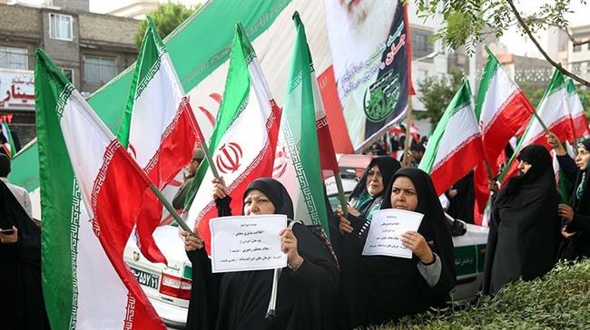 Iranians rally in the holy city of Mashhad on May 11, 2018 to condemn the United States for its withdrawal from the 2015 nuclear deal with Iran. (Photo by Tasnim News Agency)
