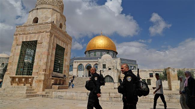 Israeli forces patrol near the Dome of the Rock at the al-Aqsa Mosque compound in the Old City of East Jerusalem al-Quds on May 13, 2018. (Photo by AFP)
