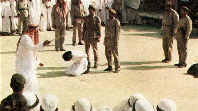 This file picture shows a man kneeling before being beheaded in Saudi Arabia.
