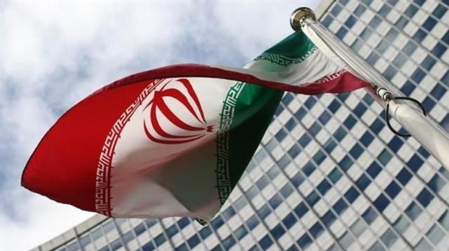 An Iranian flag flutters in front of the United Nations headquarters

