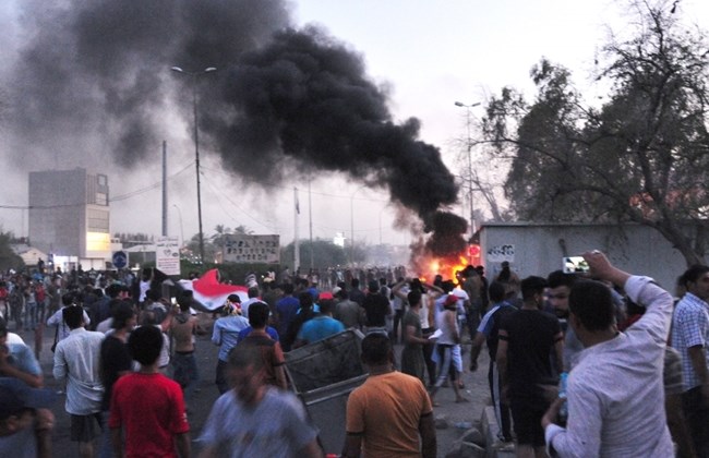 Iraqis clash with police in Basra over living conditions
