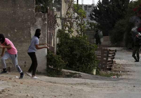 Israeli Soldiers Clash with Palestinian Protesters in West Bank City of Nablus 