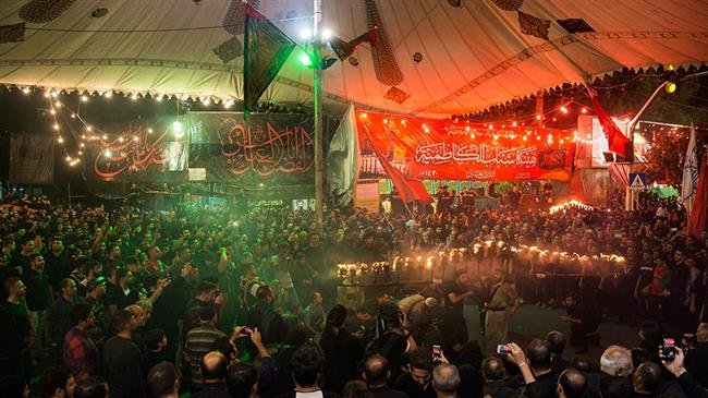 Shia Muslims attend mourning ceremonies on the eve of Ashura, in Tehran, Iran, September 19, 2018. (Photo by Fars news agency)
