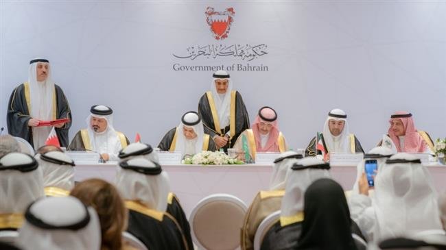 Officials from Saudi Arabia, Kuwait and the United Arab Emirates sign an agreement to give Bahrain $10 billion to support the country