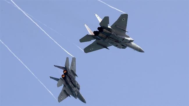 In this file photo taken on April 12, 2018, Israeli F-15 warplanes perform a rehearsal ahead of an airshow in Tel Aviv. (Photo by AFP)
