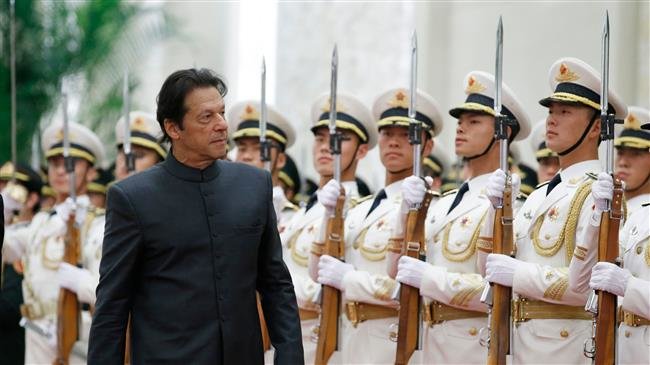 Pakistani Prime Minister Imran Khan attends a welcome ceremony hosted by China