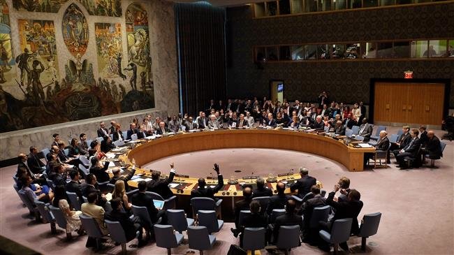 In this file photo taken on July 20, 2015, United Nations Security Council members vote on the Iran resolution at the UN headquarters in New York. (Photo by AFP)
