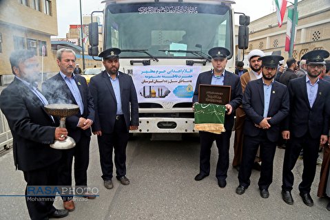 Khadims of the Shrine of Fatima Masumeh preparing to take relief and aid packages to flood-stricken provinces of Iran