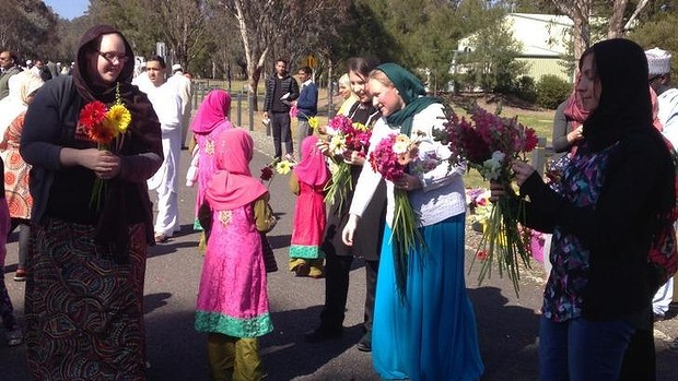 Australian Non-Muslim offering Flowers to Muslims