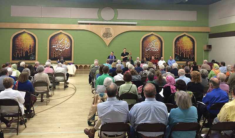 Worship of the Unitarian Universalist congregation held in the gymnasium of the Islamic Centre of Greater Lansing