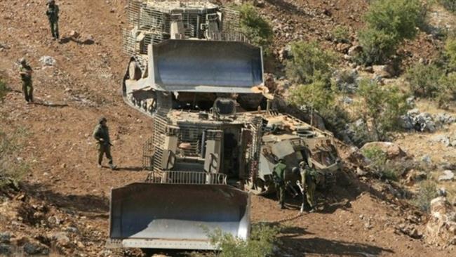 Israeli forces are seen retrieving a bulldozer that has crashed in the occupied Shebaa Farms, August, 17, 2016