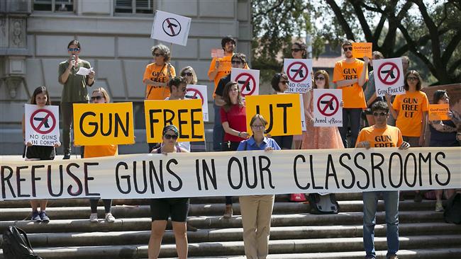 Students of the University of Texas protest the so-called "campus carry" law