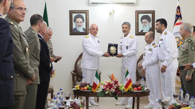 Italian Rear-Admiral Roberto Chia Marcella (C-L) and Iran’s Navy Commander Rear-Admiral Habibollah Sayyari (C-R) during a meeting in the Iranian capital, Tehran, September 5, 2016