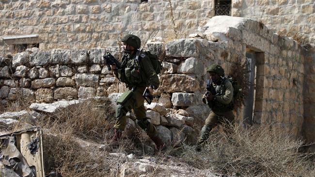 Israeli soldiers conduct searches in the northern West Bank village of Madama on August 24, 2016. ©AFP