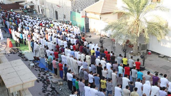Bahrainis hold Eid al-Adha prayers near the house of senior Shi’a cleric Ayatollah Isa Qasim in the northwestern village of Diraz, September 12, 2016.