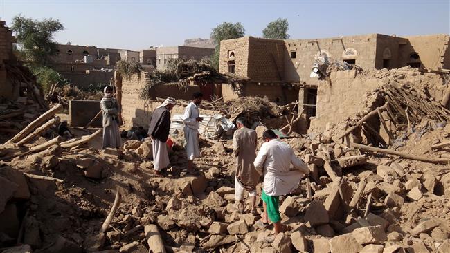 Yemenis search for victims under the rubble of houses the day after they were hit in a Saudi airstrike in Yemen