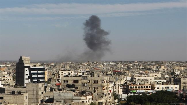 Smoke rises following an Israeli air strike in Rafah, in the southern Gaza Strip, on May 5, 2016. (Photo by AFP)