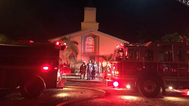 Emergency personnel are seen at the Islamic Center of Fort Pierce which was set on fire, in Fort Pierce, Florida, September 12, 2016. (AFP photo)